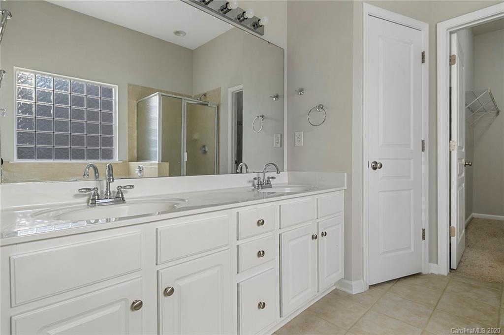 268 Sand Paver Way Fort Mill, SC 29708 - Photo 16 of 23 a bathroom with double sink and a mirror