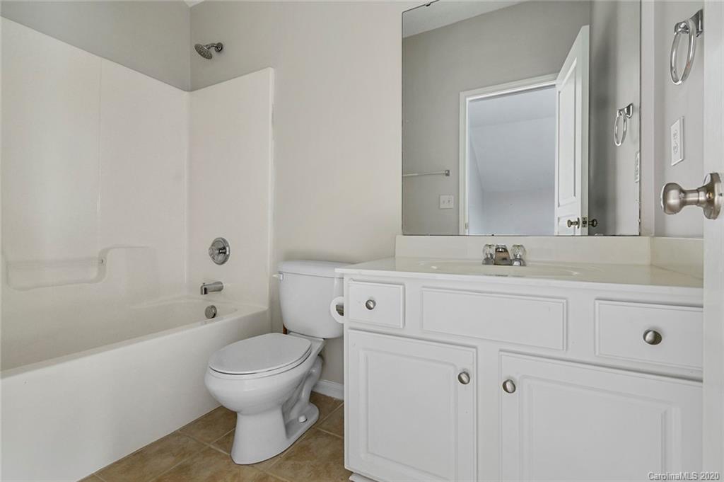 268 Sand Paver Way Fort Mill, SC 29708 - Photo 23 of 23 a bathroom with a sink toilet and a mirror