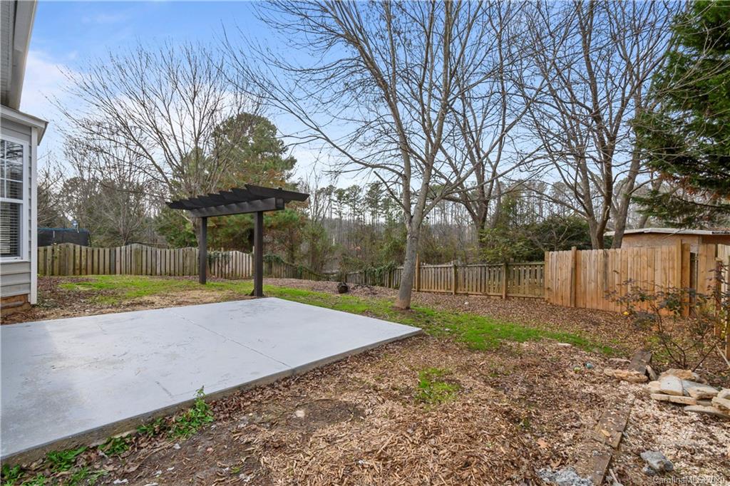 268 Sand Paver Way Fort Mill, SC 29708 - Photo 6 of 23 a view of a backyard with tree s
