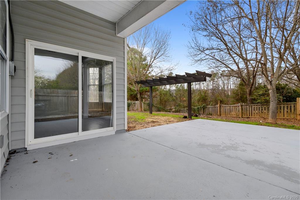 268 Sand Paver Way Fort Mill, SC 29708 - Photo 7 of 23 a view of an empty room with a large window and yard