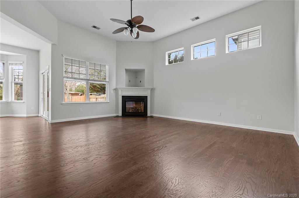 268 Sand Paver Way Fort Mill, SC 29708 - Photo 9 of 23 a view of an empty room with a window and fireplace
