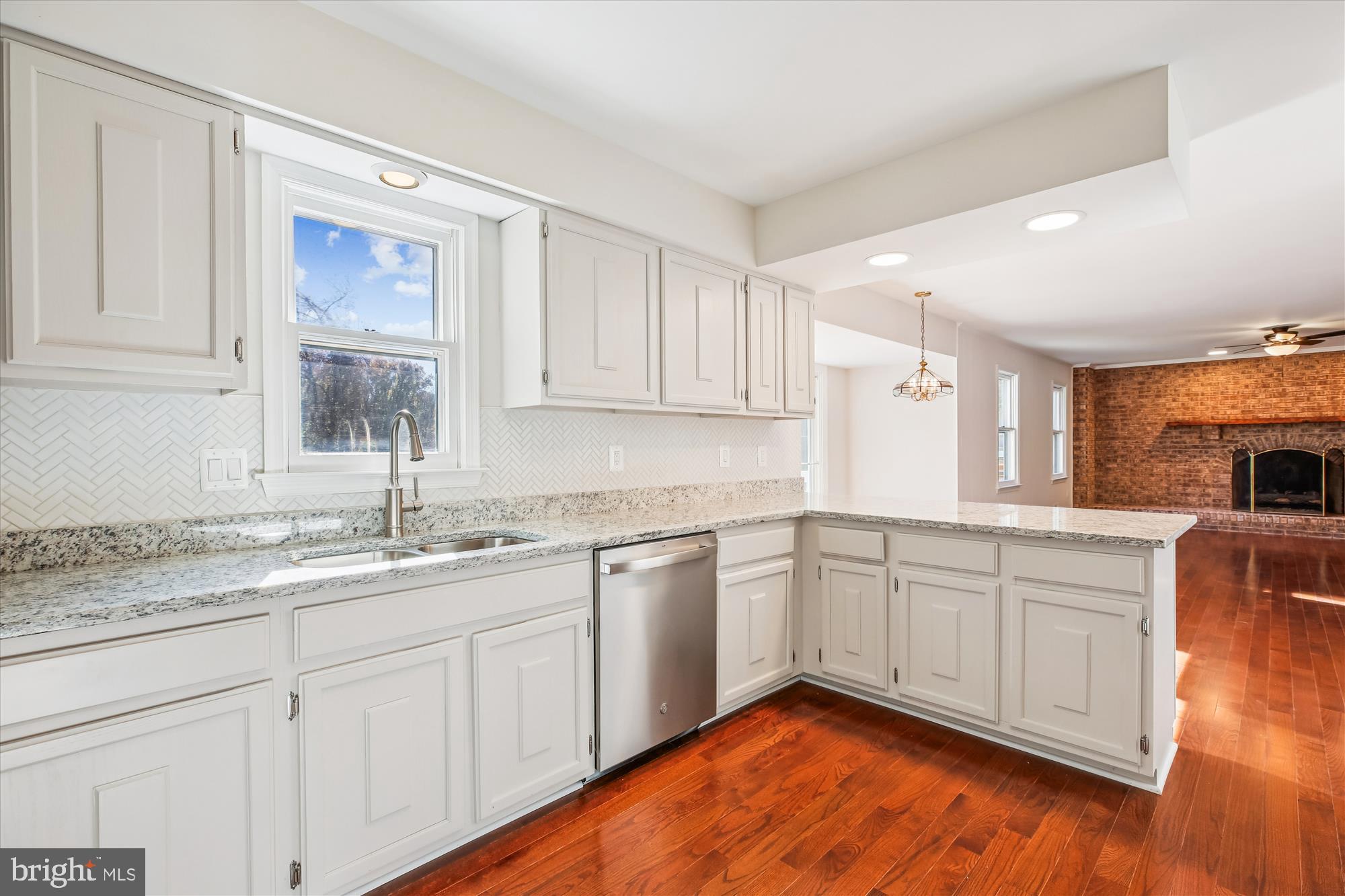 17 Locustwood Court Silver Spring, MD 20905 - Photo 23 of 72 a kitchen with granite countertop stainless steel appliances sink and cabinets