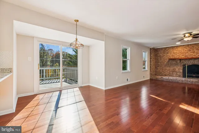 a white toilet sitting next to a bath tub