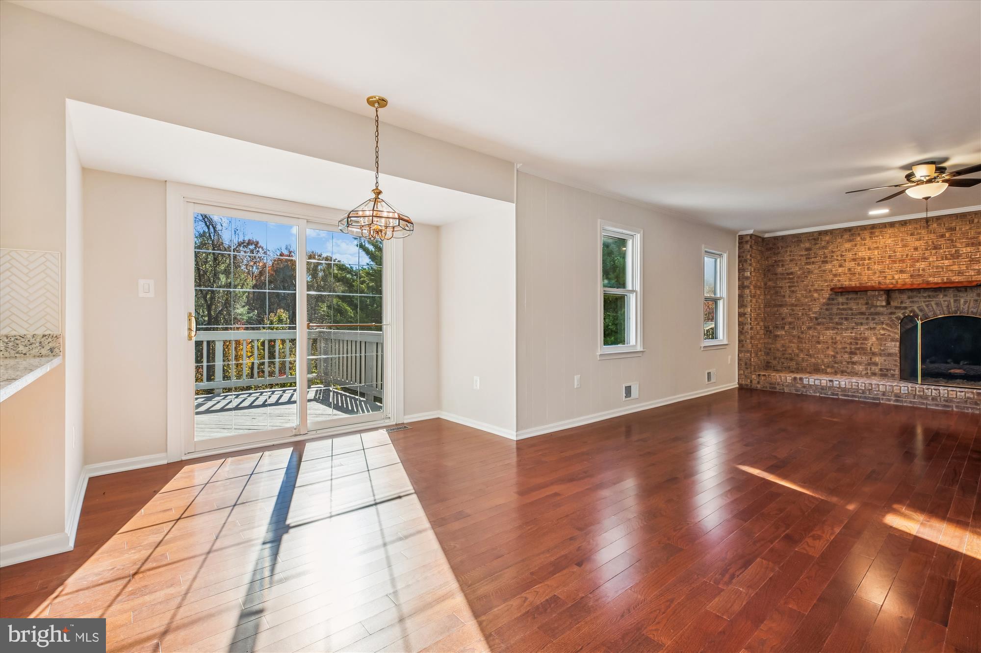 17 Locustwood Court Silver Spring, MD 20905 - Photo 24 of 72 a view of a room with wooden floor fireplace and windows