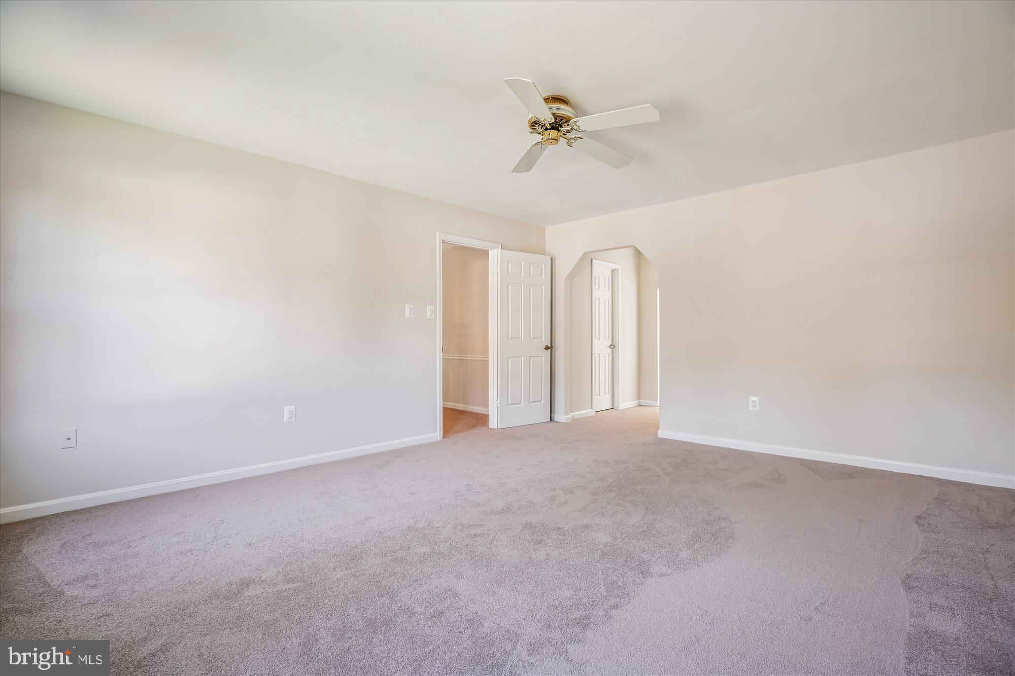 17 Locustwood Court Silver Spring, MD 20905 - Photo 33 of 72 a view of an empty room with a chandelier fan