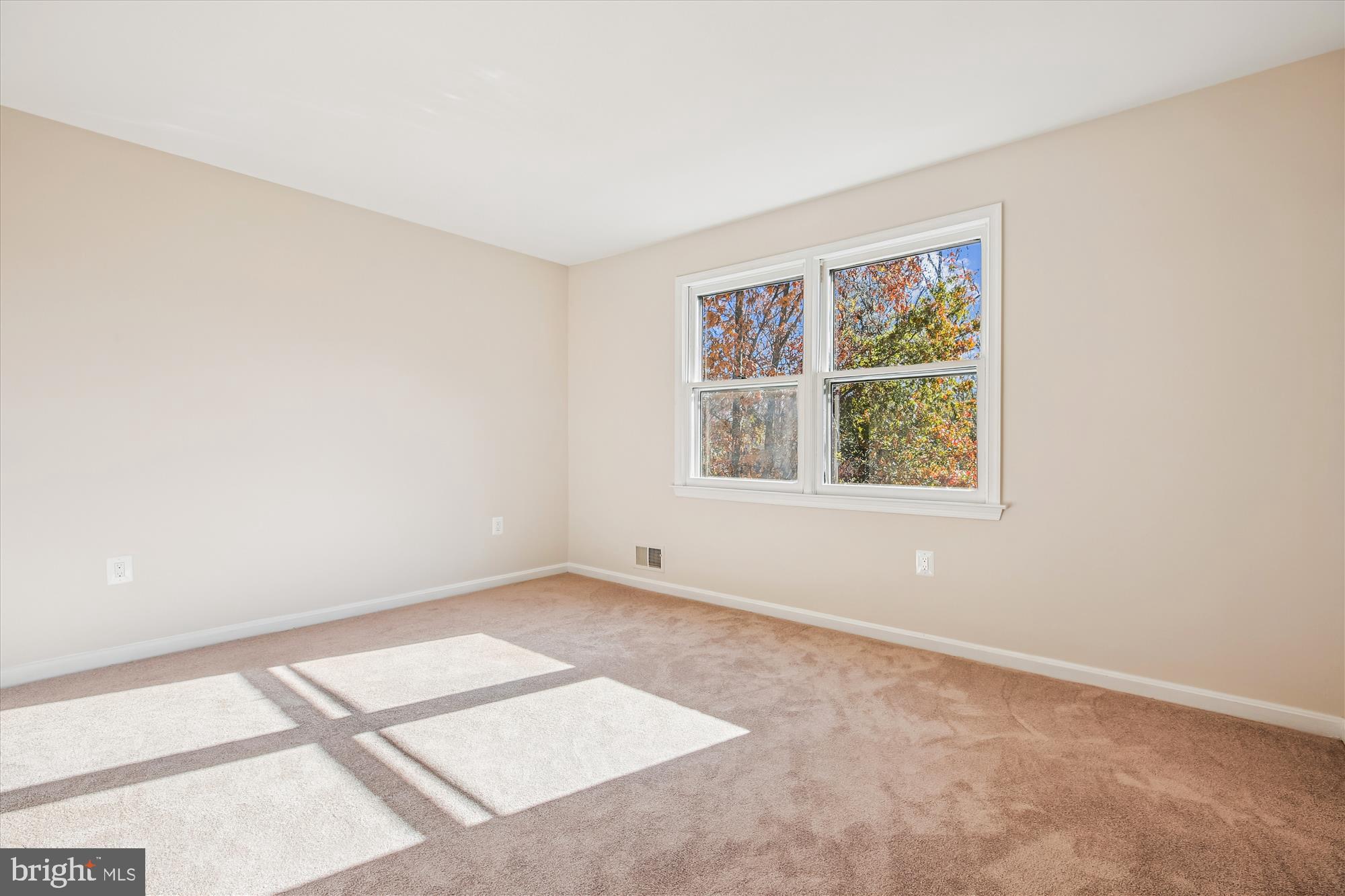 17 Locustwood Court Silver Spring, MD 20905 - Photo 47 of 72 an empty room with windows