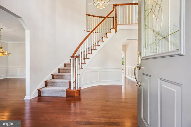 a view of a hallway with a kitchen