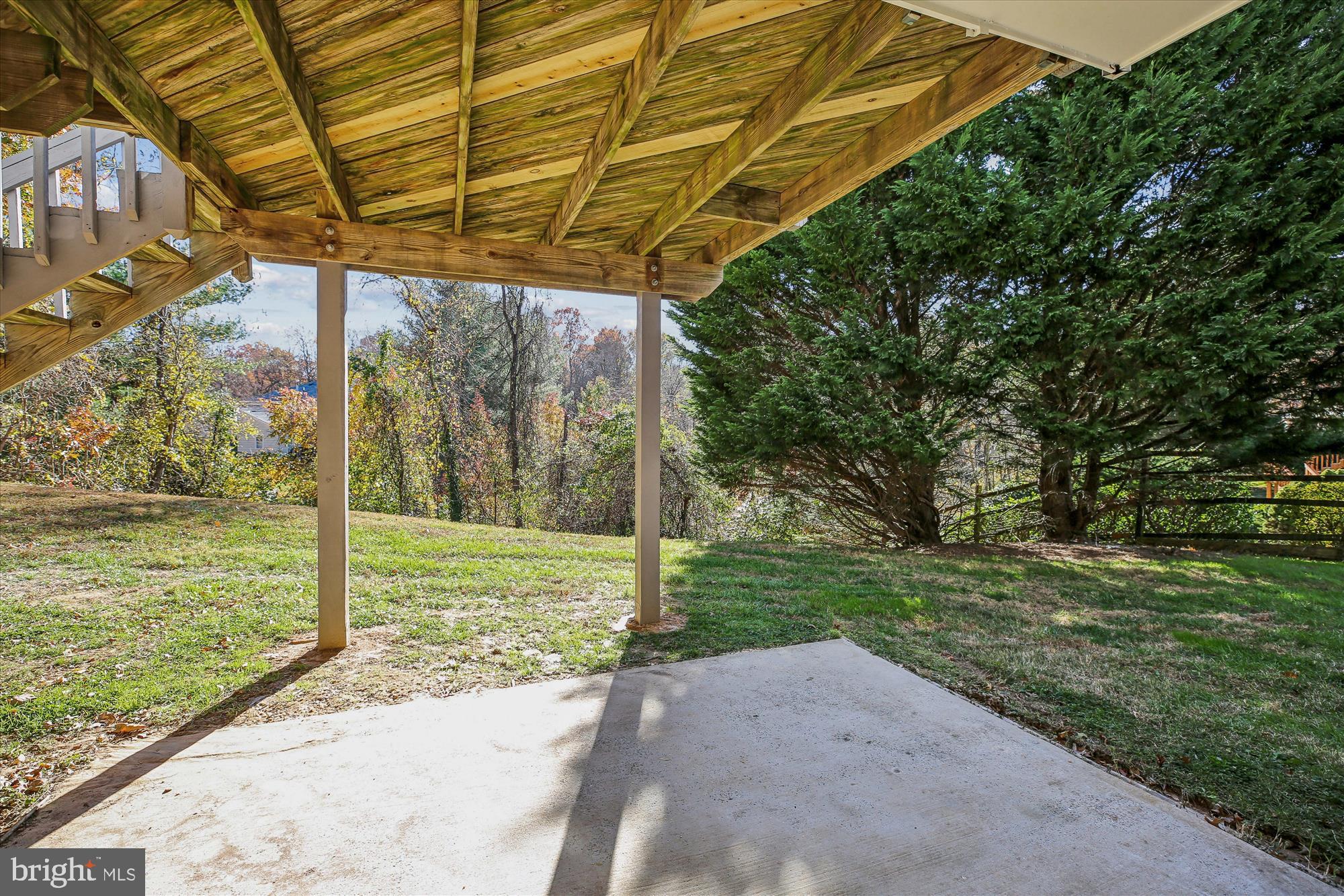 17 Locustwood Court Silver Spring, MD 20905 - Photo 68 of 72 a view of a backyard with plants and a backyard