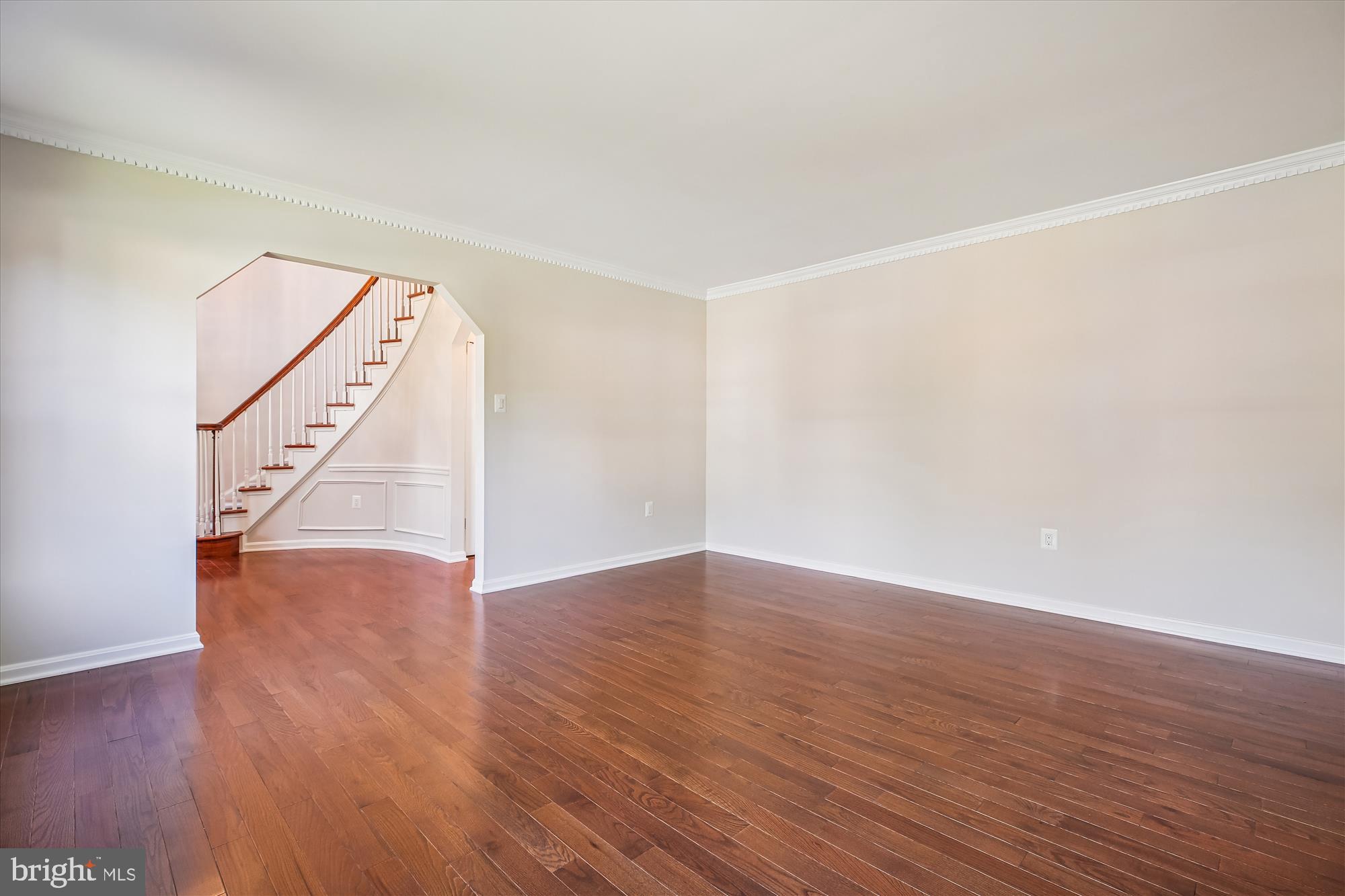 17 Locustwood Court Silver Spring, MD 20905 - Photo 9 of 72 a view of an empty room with wooden floor