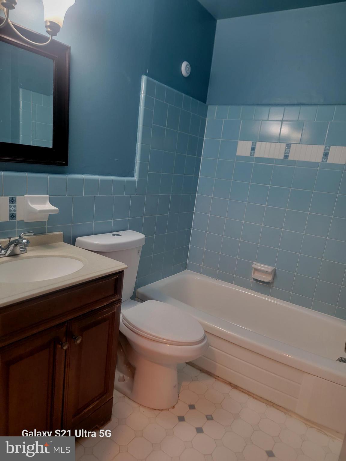 1600 Church Road, Unit C311 Wyncote, PA 19095 - Photo 23 of 26 a bathroom with a sink a toilet and shower