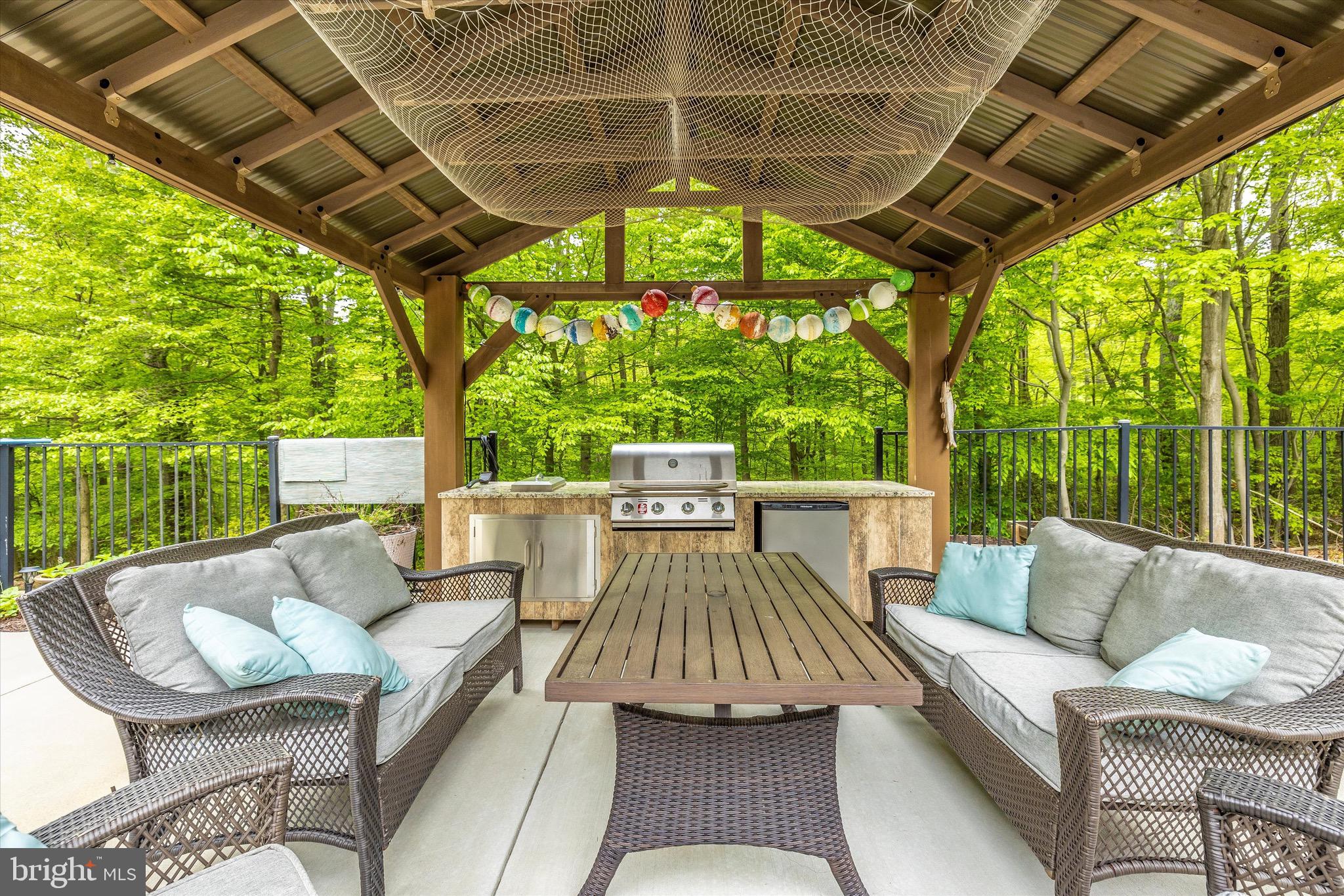 3370 Basford Road Frederick, MD 21703 - Photo 59 of 70 Covered area with built in grill, fridge & storage