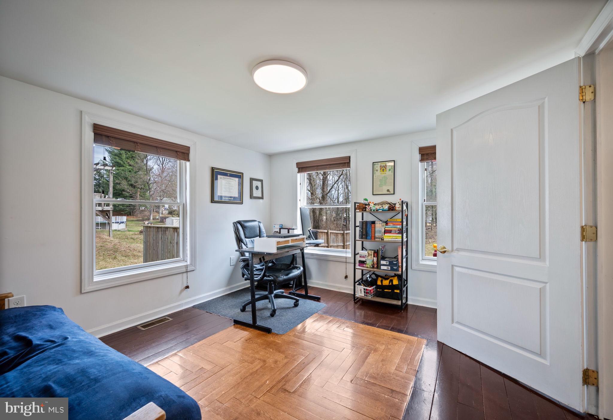 13403 Catoctin Furnace Road Thurmont, MD 21788 - Photo 25 of 60 a living room with furniture and a window