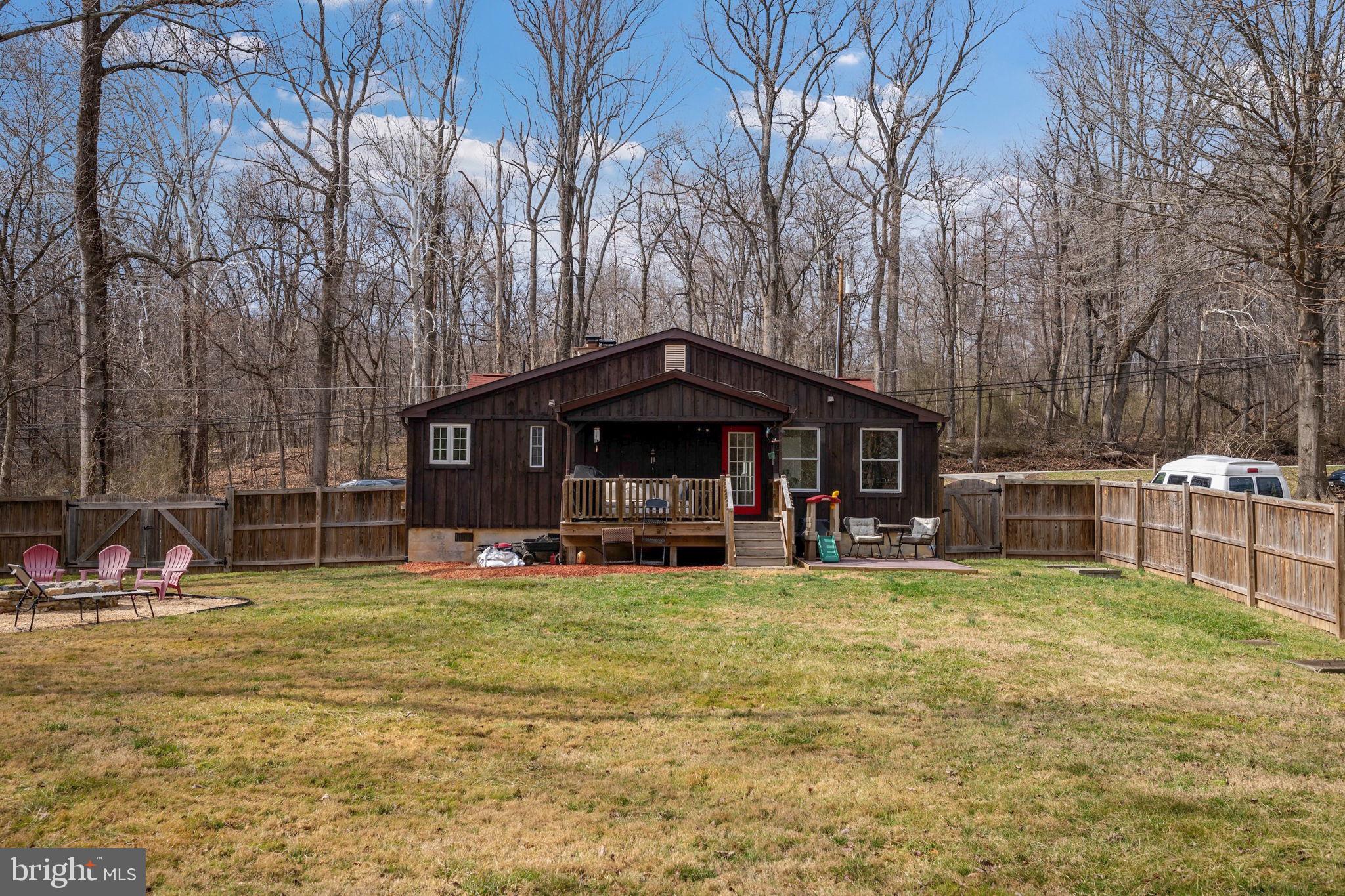 13403 Catoctin Furnace Road Thurmont, MD 21788 - Photo 39 of 60 a view of a house with swimming pool and sitting area