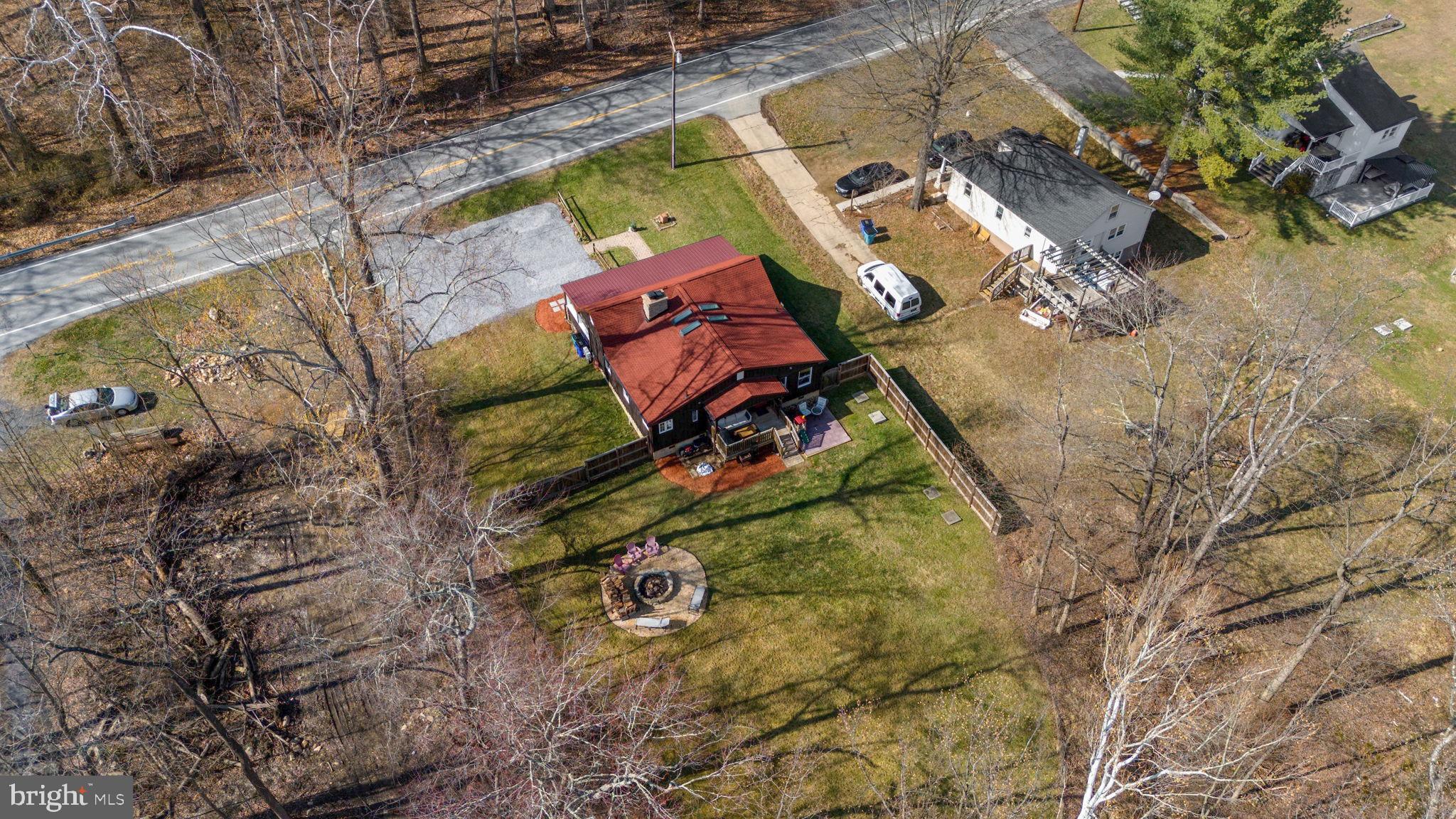 13403 Catoctin Furnace Road Thurmont, MD 21788 - Photo 49 of 60 an aerial view of a house with a yard and trees