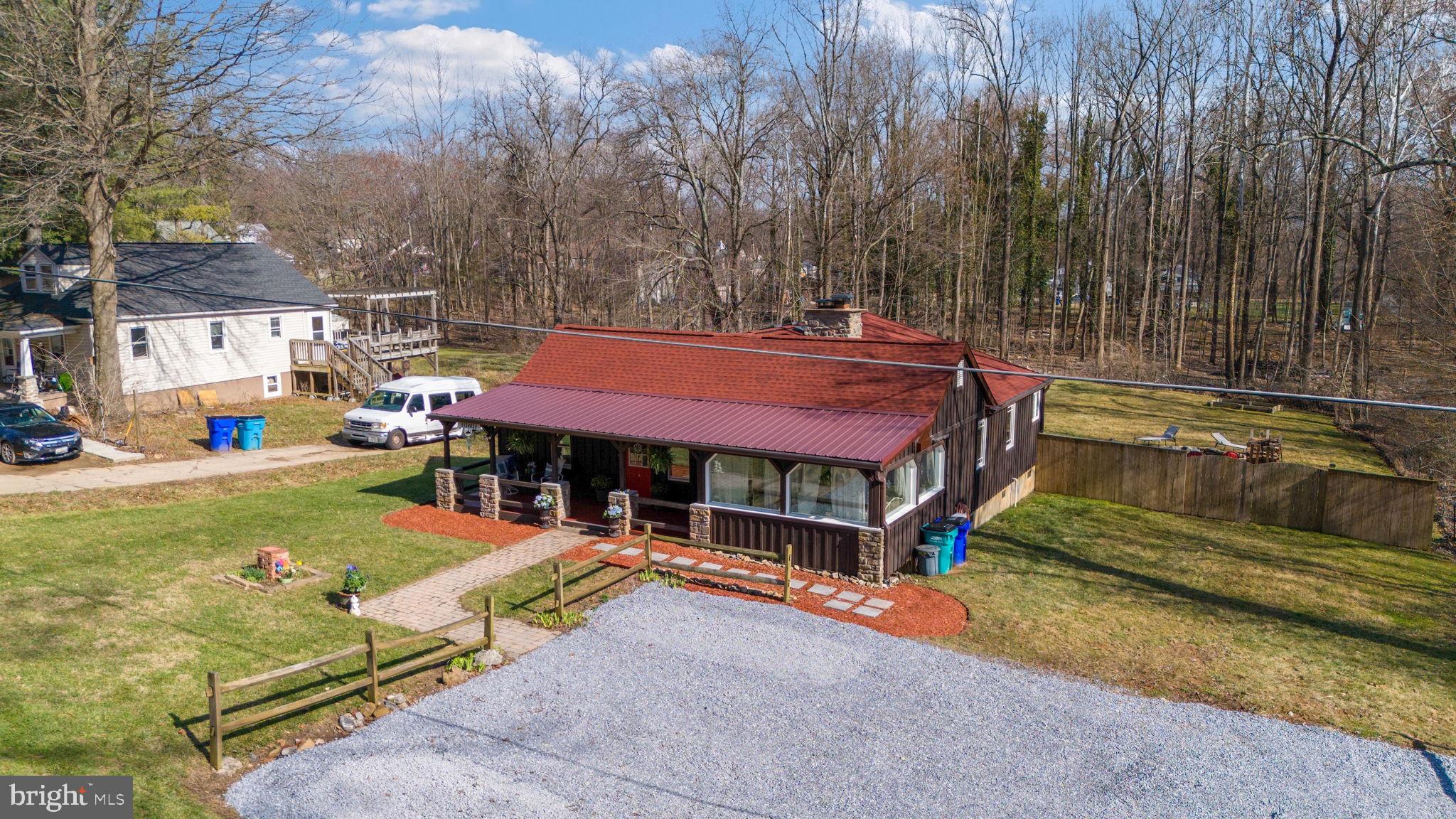 13403 Catoctin Furnace Road Thurmont, MD 21788 - Photo 51 of 60 a view of a backyard with a sitting area