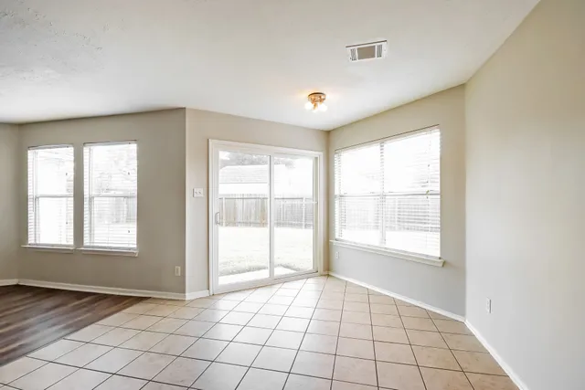 an empty room with windows