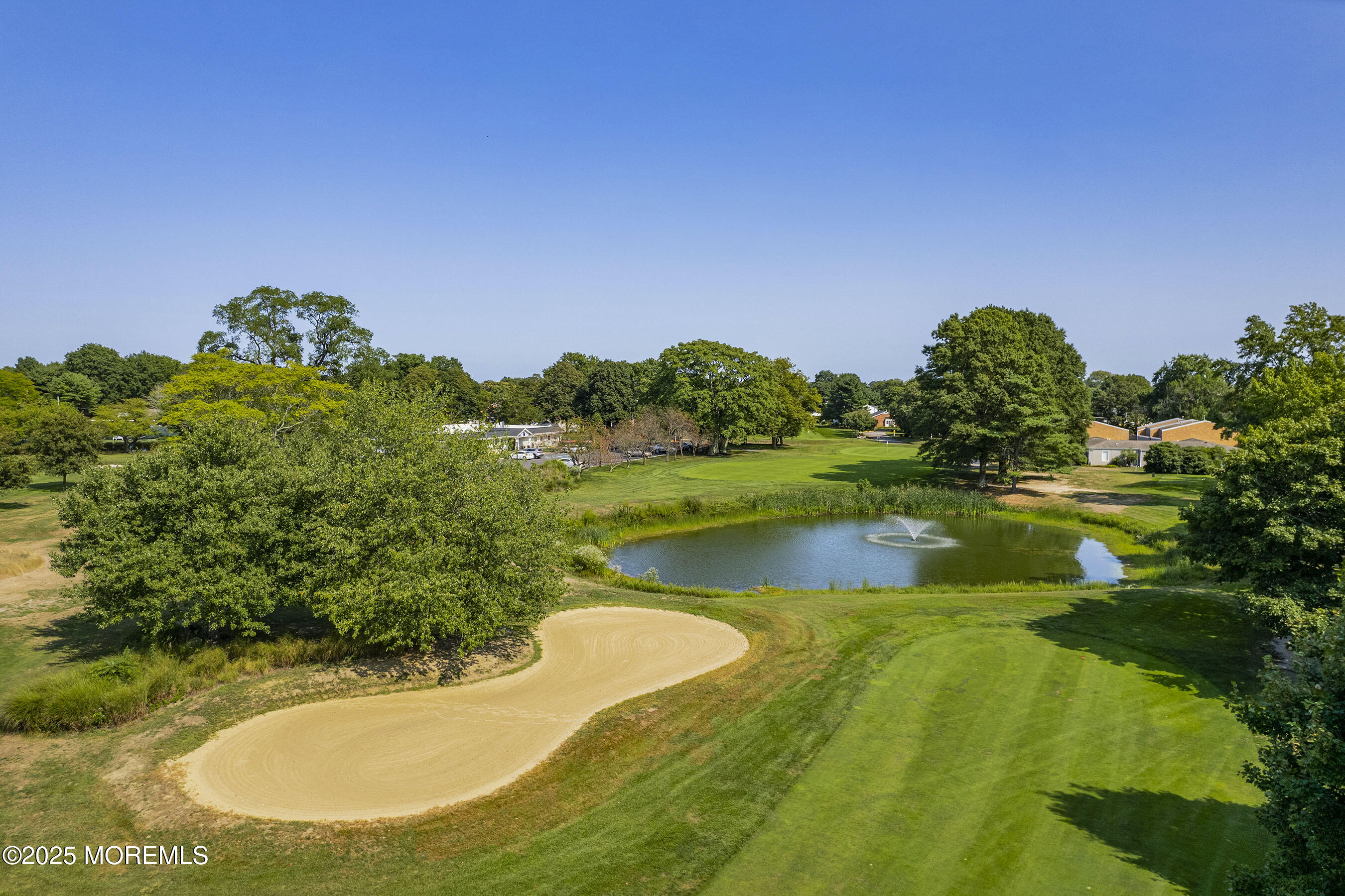 59 Walnut Drive Spring Lake Heights, NJ 07762 - Photo 39 of 59 a view of a golf course with a swimming pool