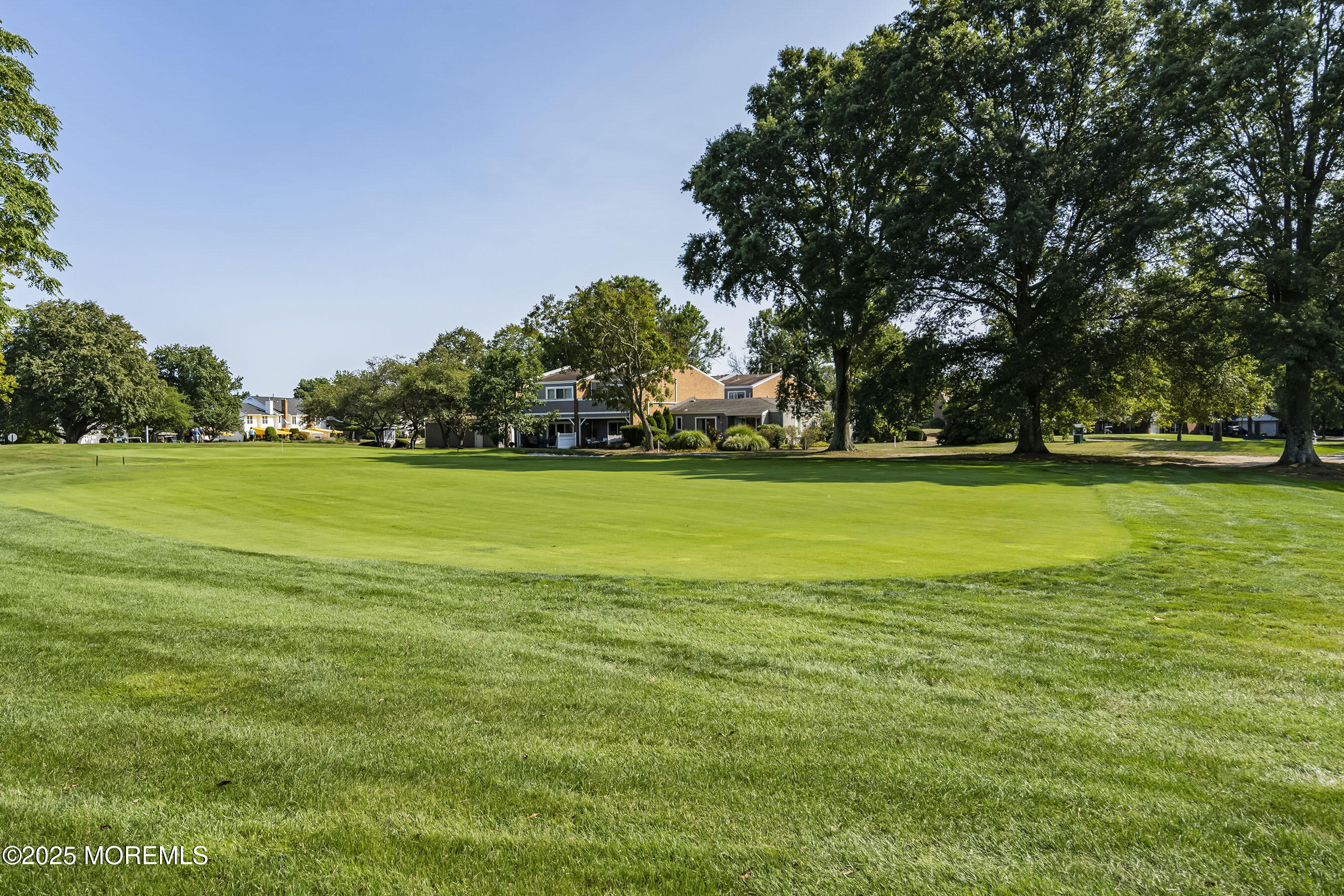 59 Walnut Drive Spring Lake Heights, NJ 07762 - Photo 52 of 59 a view of a grassy field with trees
