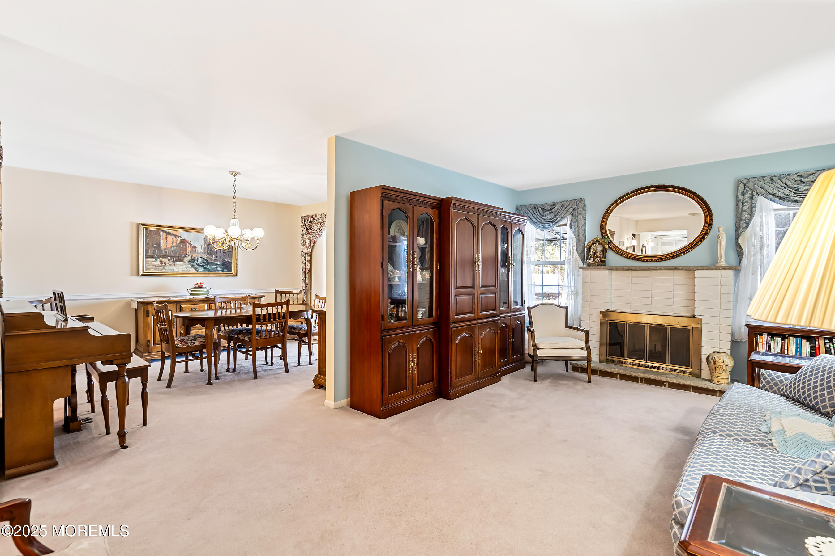 59 Walnut Drive Spring Lake Heights, NJ 07762 - Photo 8 of 59 a living room with fireplace furniture and a large window