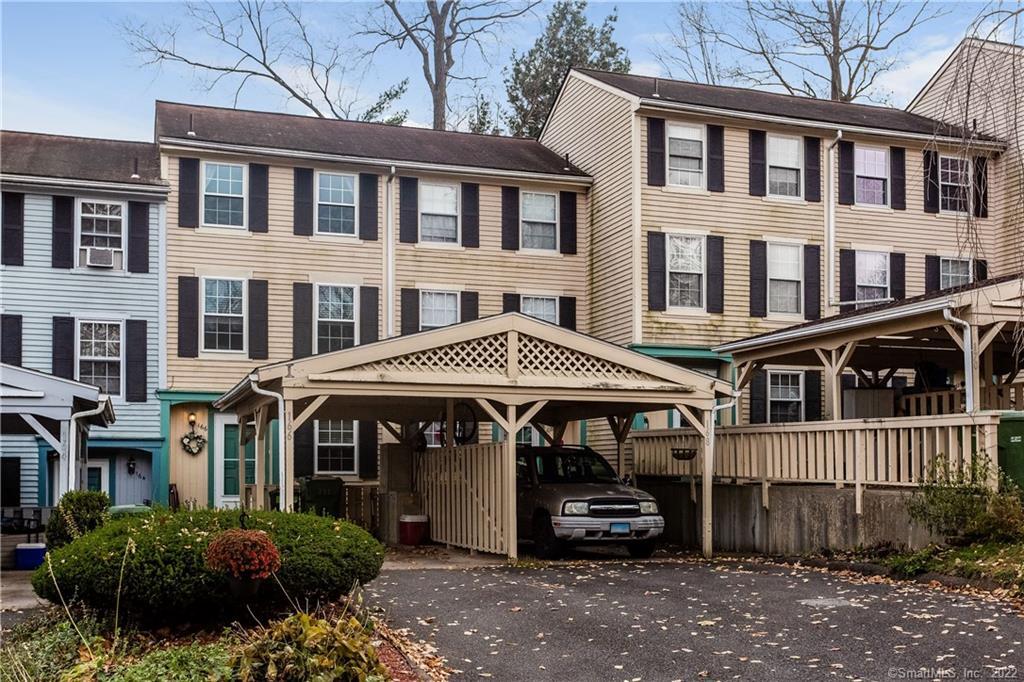 166 Rising Trail Drive, Unit 166 Middletown, CT 06457 - Photo 1 of 1 Welcome to 166 Rising Trail in desirable Beacon Hill! Unit 166 is shown here next to the gray unit. (carport is empty)