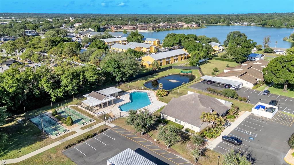 2025 Sylvester Road, Unit N305 Lakeland, FL 33803 - Photo 25 of 34 an aerial view of residential houses with outdoor space