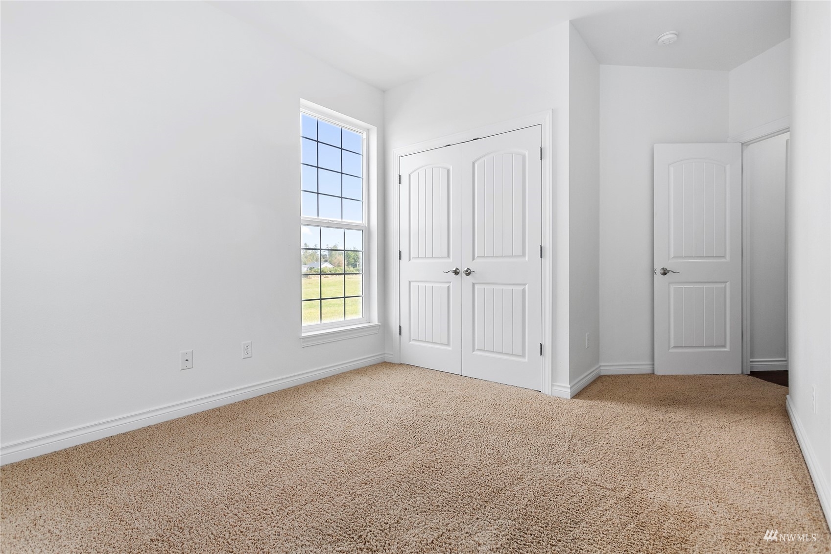 4906 Graveline Road Bellingham, WA 98226 - Photo 17 of 30 a view of an empty room with a window