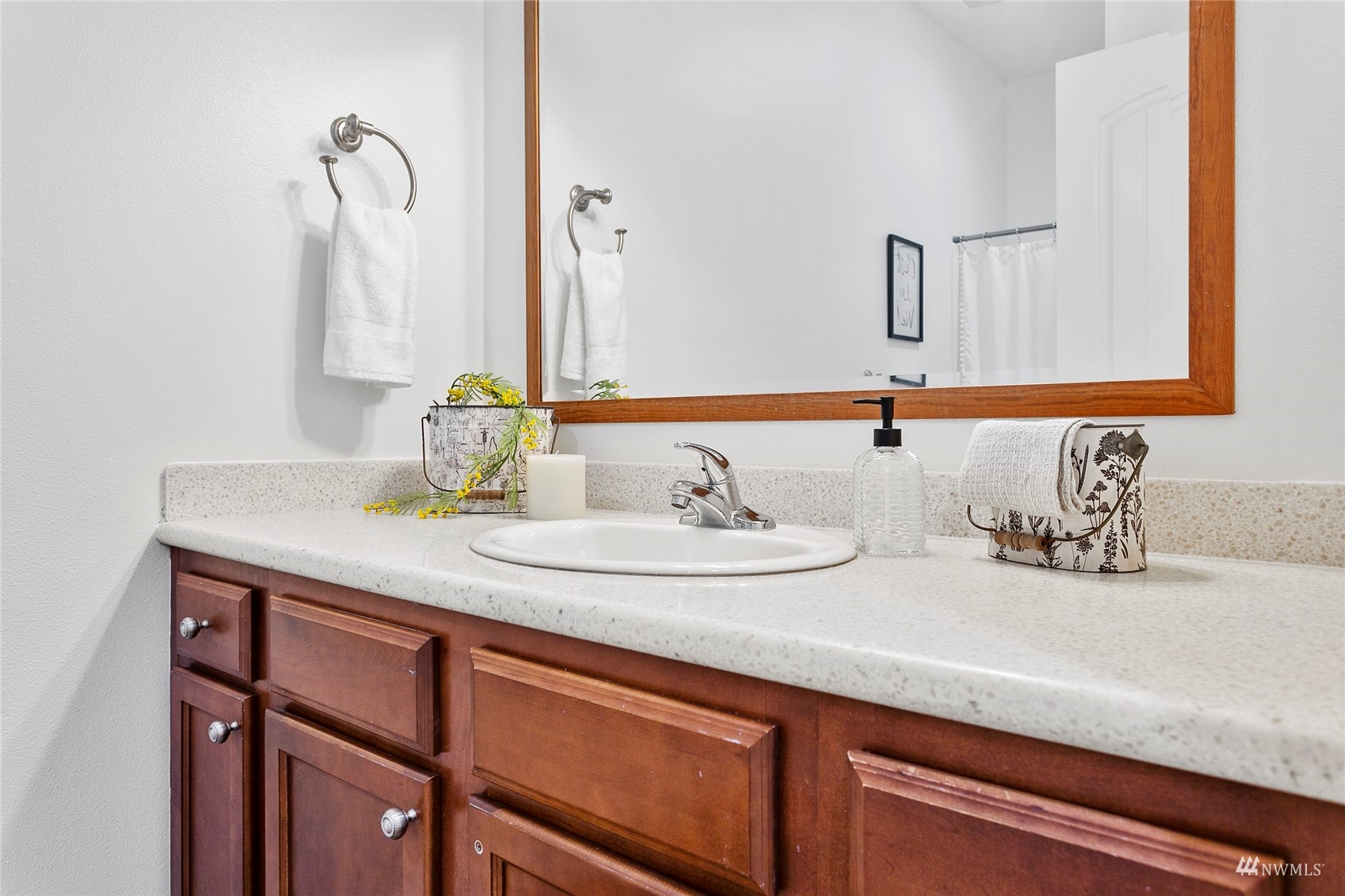 4906 Graveline Road Bellingham, WA 98226 - Photo 20 of 30 a bathroom with a sink and a mirror