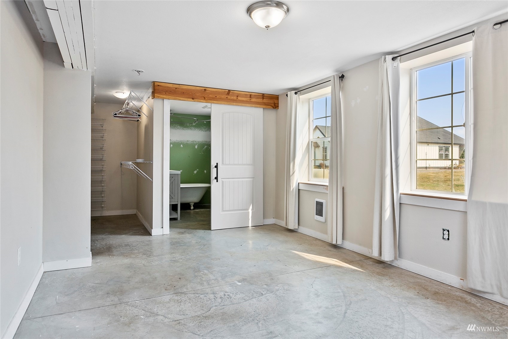 4906 Graveline Road Bellingham, WA 98226 - Photo 25 of 30 wooden floor in an empty room with a window