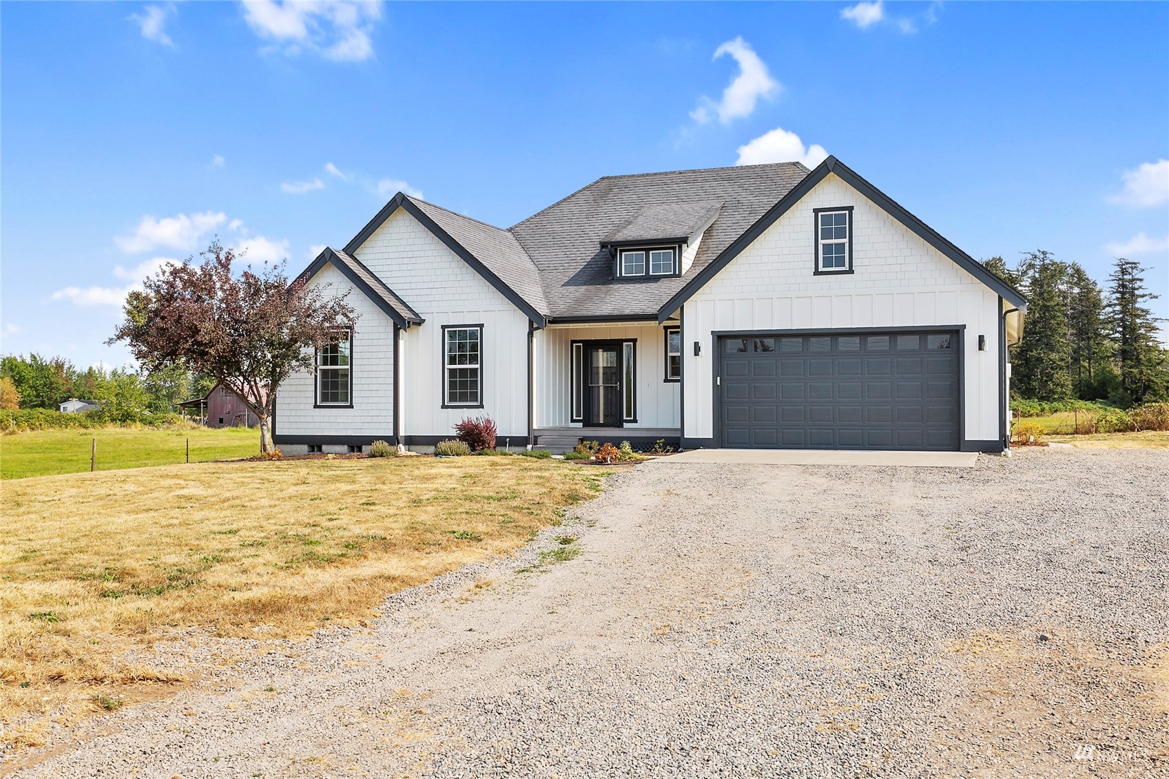4906 Graveline Road Bellingham, WA 98226 - Photo 28 of 30 a view of a house with a yard and swimming pool