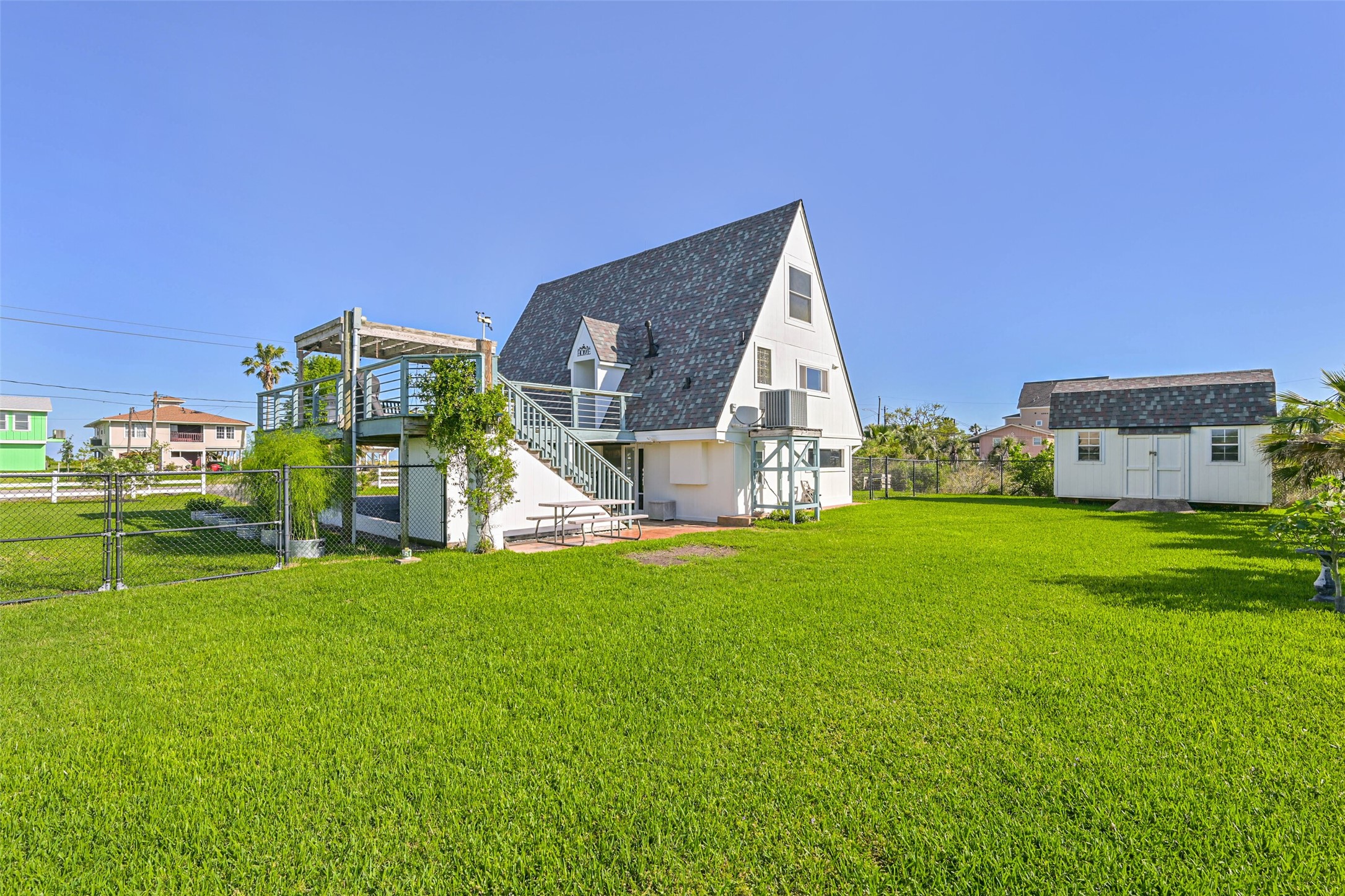 2009 Todville Road Seabrook, TX 77586 - Photo 44 of 46 a view of a house with a big yard and large trees