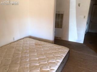 38120 Trogilo Road Rush, CO 80833 - Photo 9 of 16 a view of empty room with wooden floor