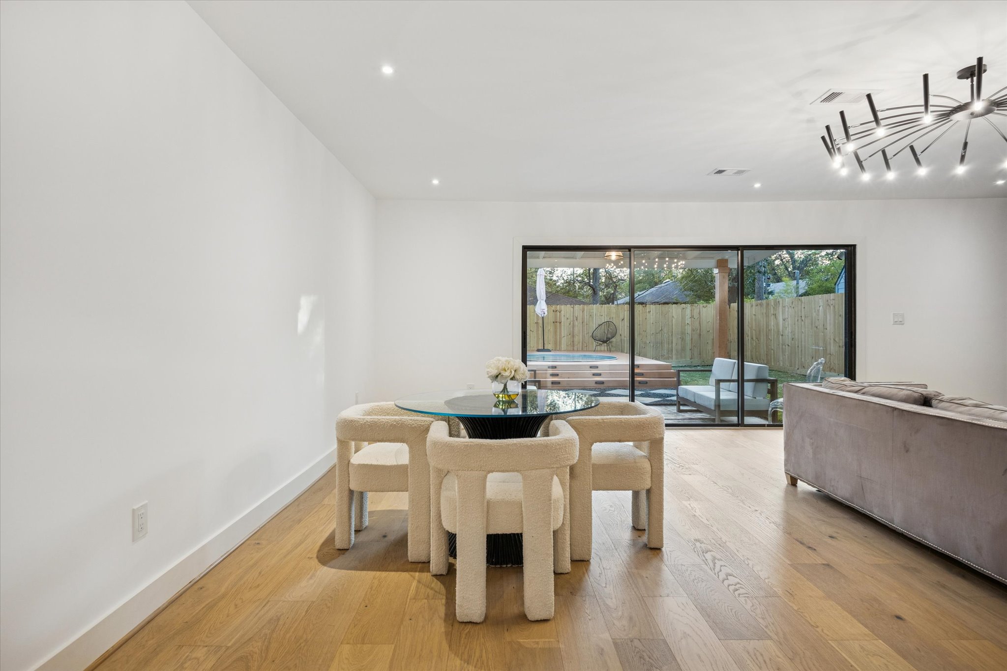 1611 Ridgehaven Drive Austin, TX 78723 - Photo 13 of 35 a living room with furniture and a large window