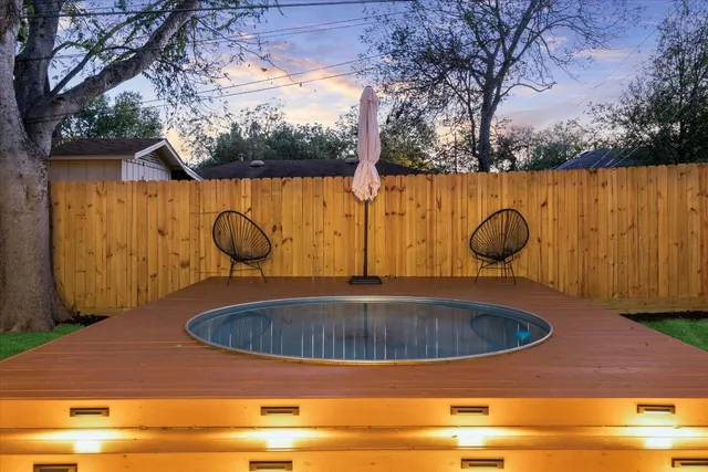 a view of outdoor space with swimming pool