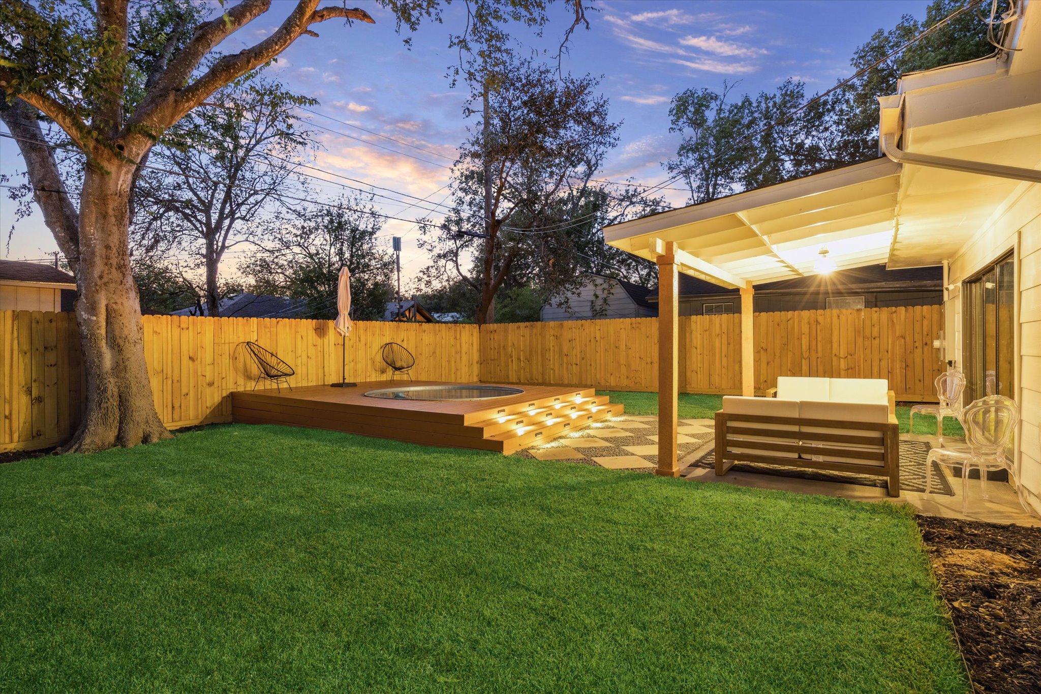 1611 Ridgehaven Drive Austin, TX 78723 - Photo 33 of 35 a view of a backyard with a small pool