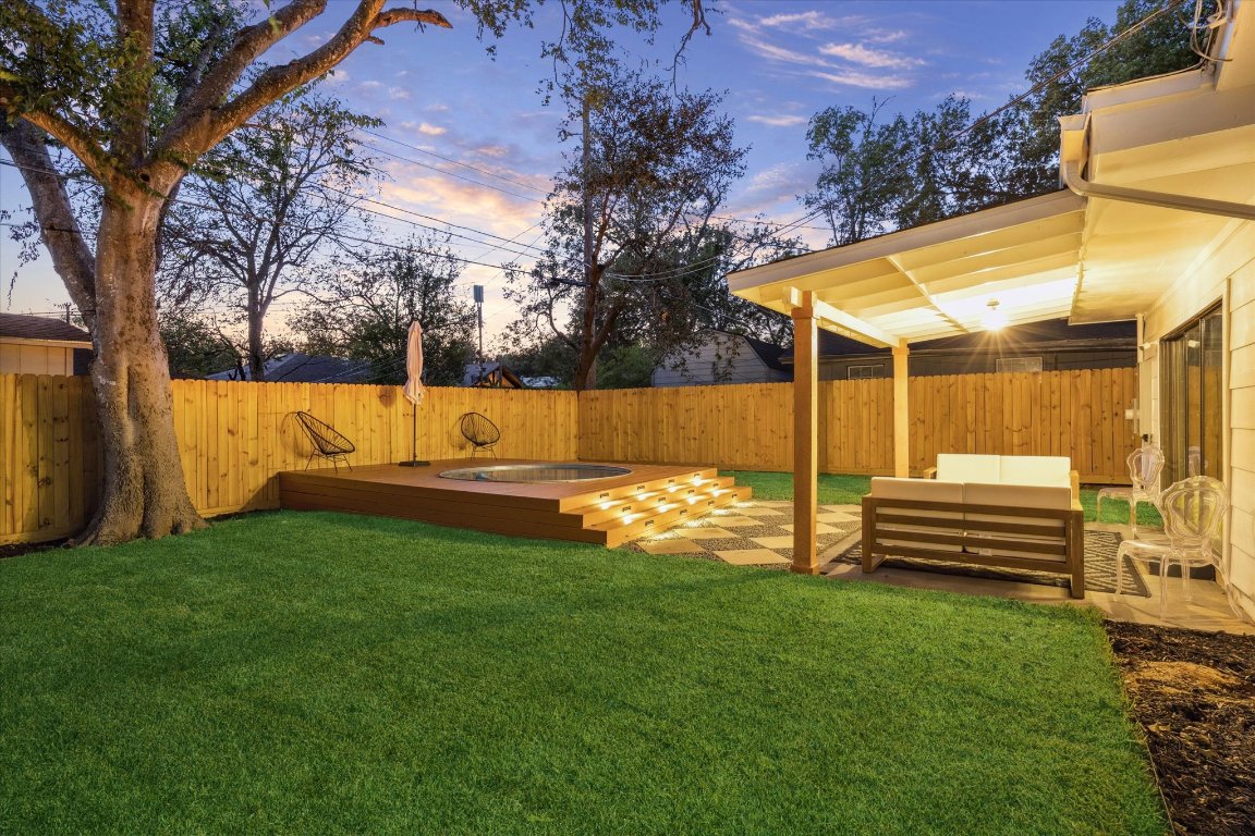 1611 Ridgehaven Drive Austin, TX 78723 - Photo 33 of 35 a view of a house with a backyard