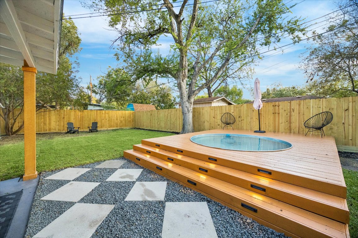 1611 Ridgehaven Drive Austin, TX 78723 - Photo 34 of 35 a view of a backyard with swimming pool