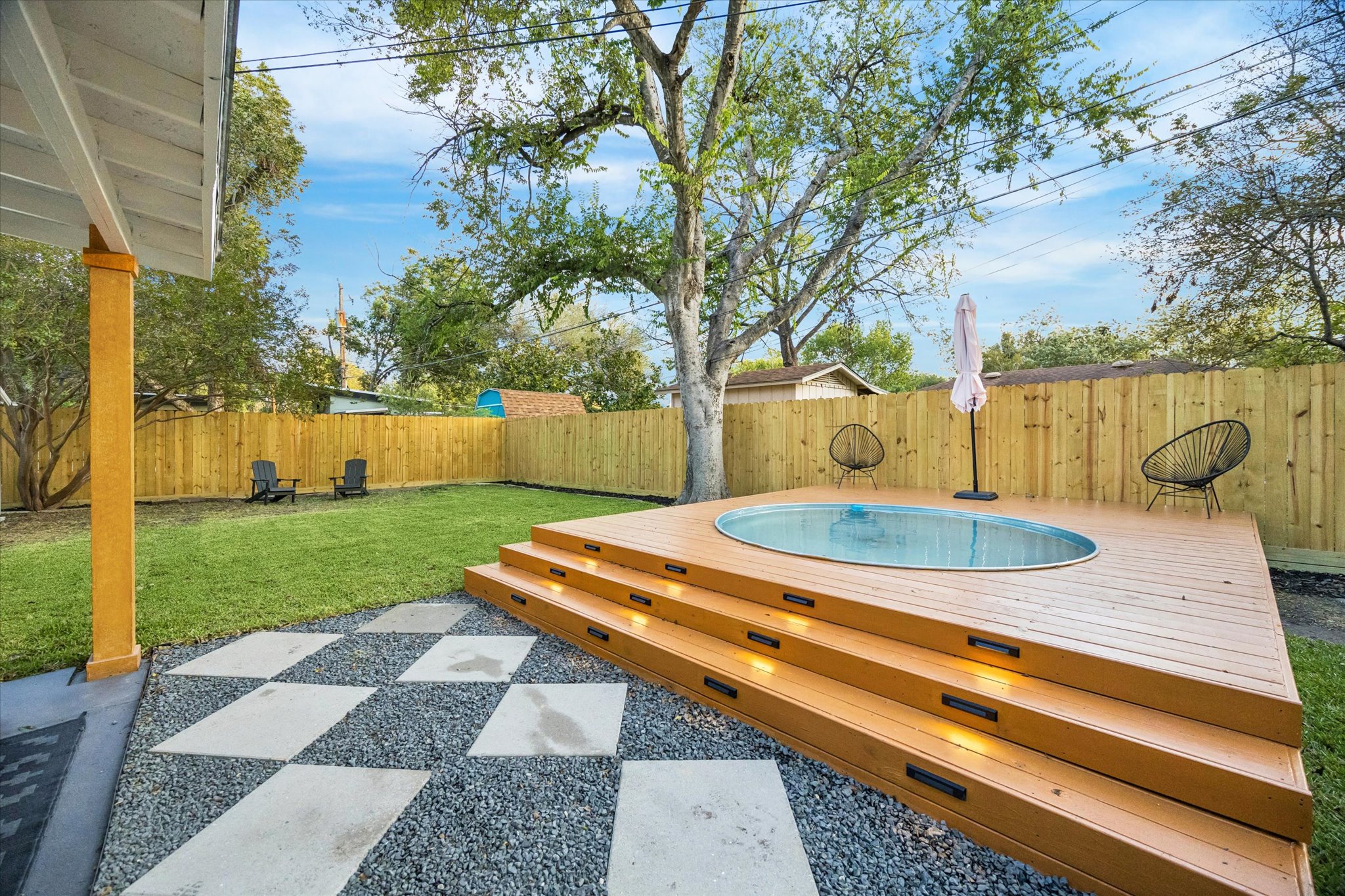 1611 Ridgehaven Drive Austin, TX 78723 - Photo 34 of 35 a view of a backyard with sitting area