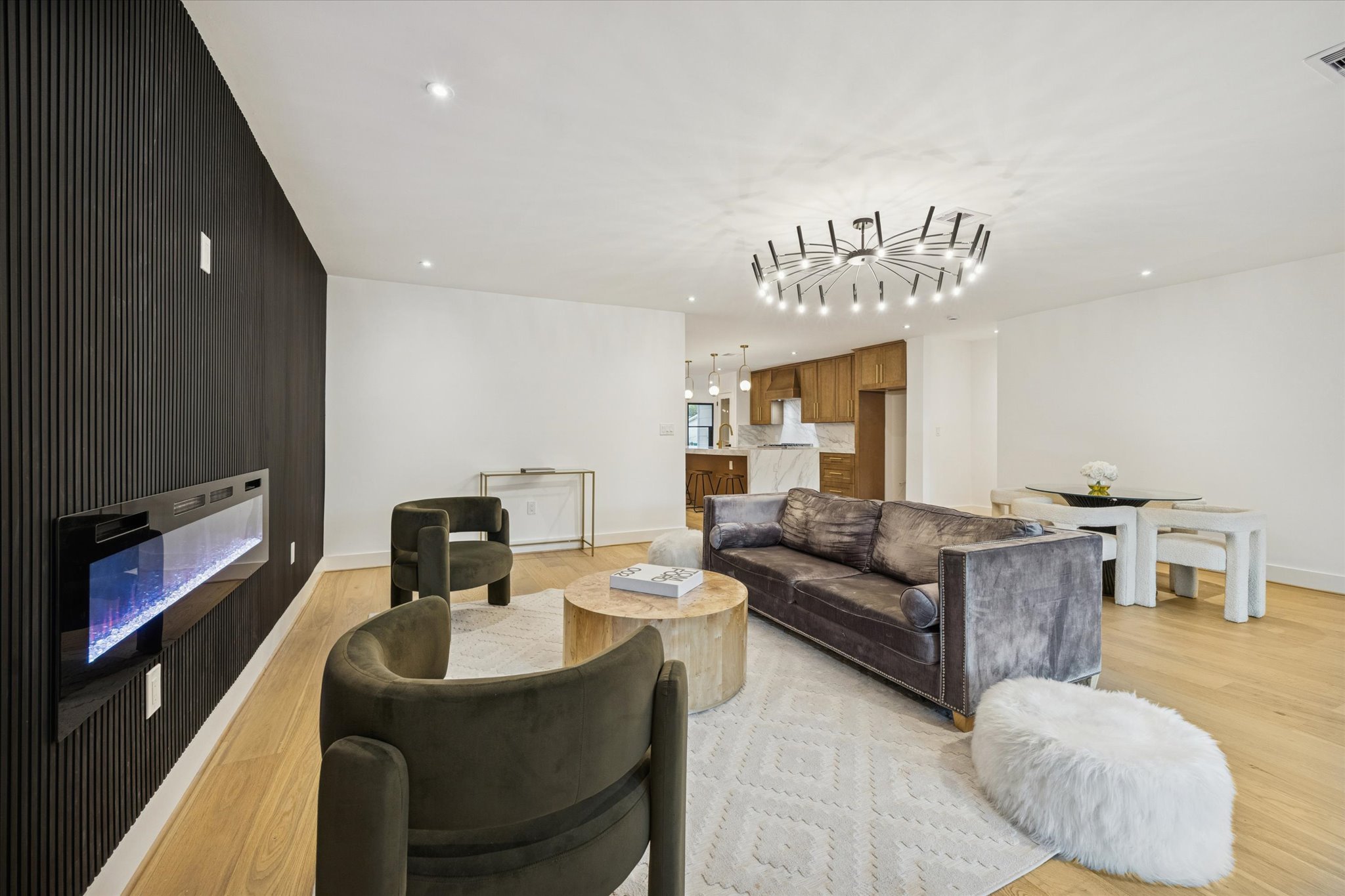 1611 Ridgehaven Drive Austin, TX 78723 - Photo 8 of 35 a living room with furniture and a flat screen tv