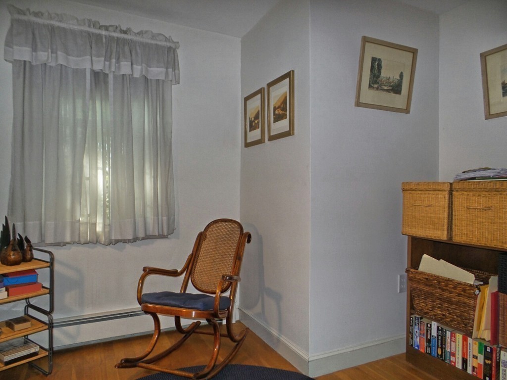 33 James Road Reading, MA 01867 - Photo 19 of 27 a view of a workspace with furniture and a window