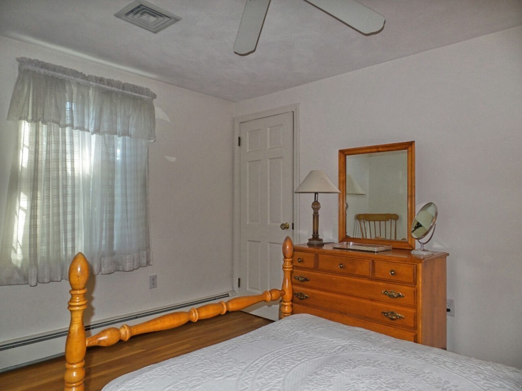 33 James Road Reading, MA 01867 - Photo 21 of 27 a room with furniture and window