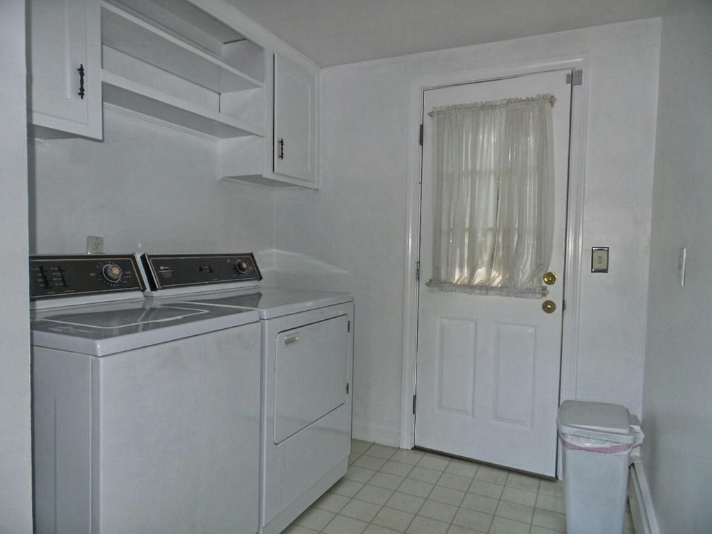 33 James Road Reading, MA 01867 - Photo 24 of 27 a utility room with dryer and washer