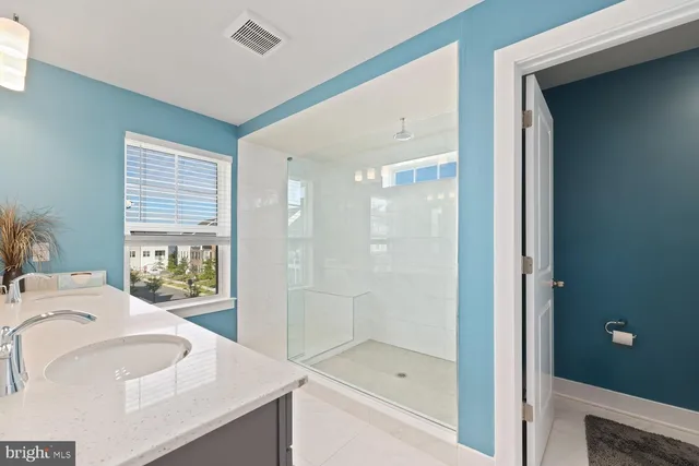 a bathroom with a sink and a bathtub