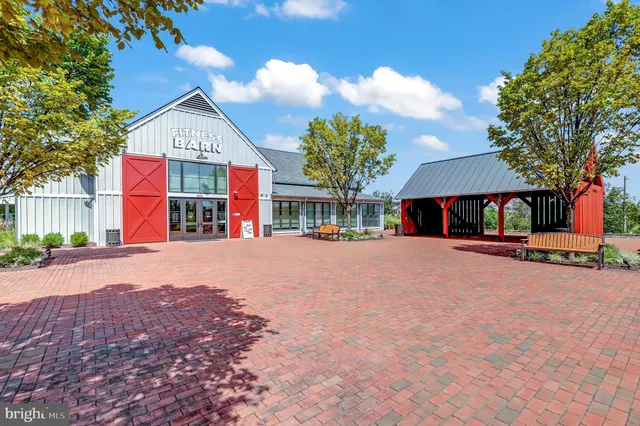 a view of a house with swimming pool