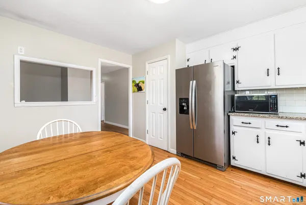 a bedroom with a bed and cabinets