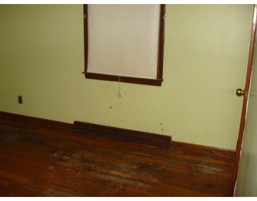 104 Hamilton Street Woonsocket, RI 02895 - Photo 8 of 8 a view of a small space with wooden floor