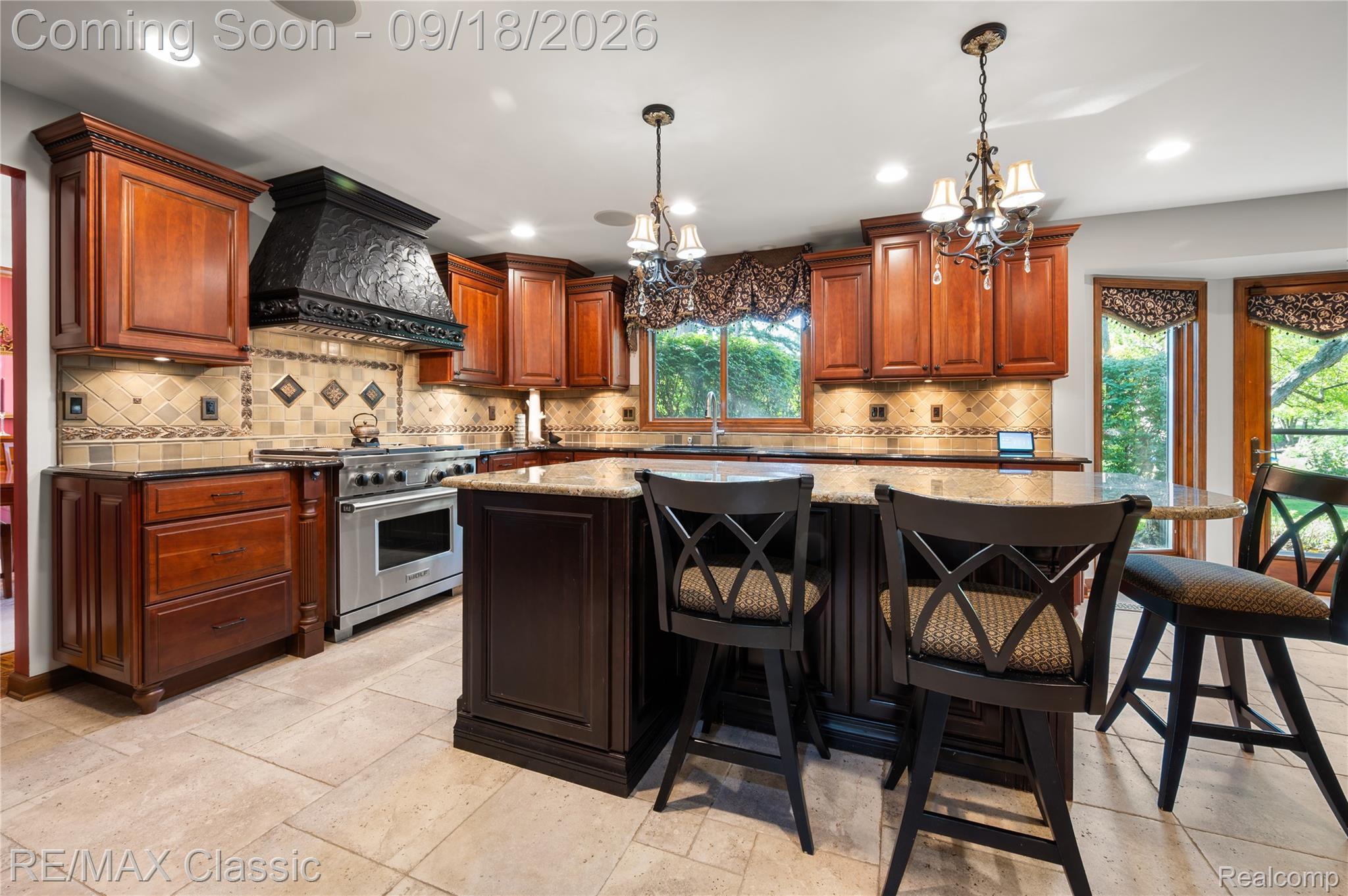 2899 Current Drive Rochester, MI 48309 - Photo 5 of 57 kitchen with granite counters, tile backsplash, under counter lighting