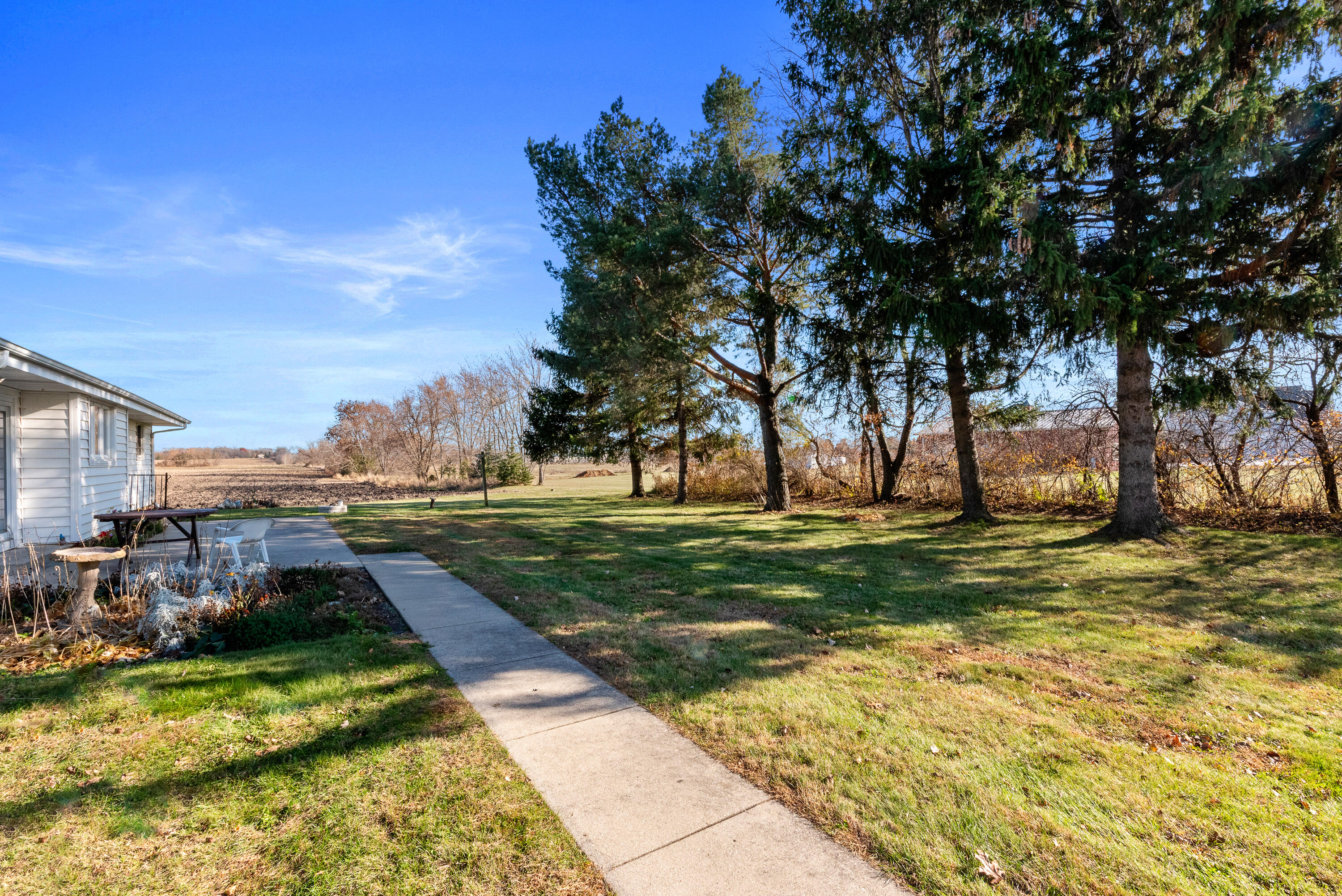 25919 Durand Avenue Dover, WI 53139 - Photo 5 of 32 Rear view of the house