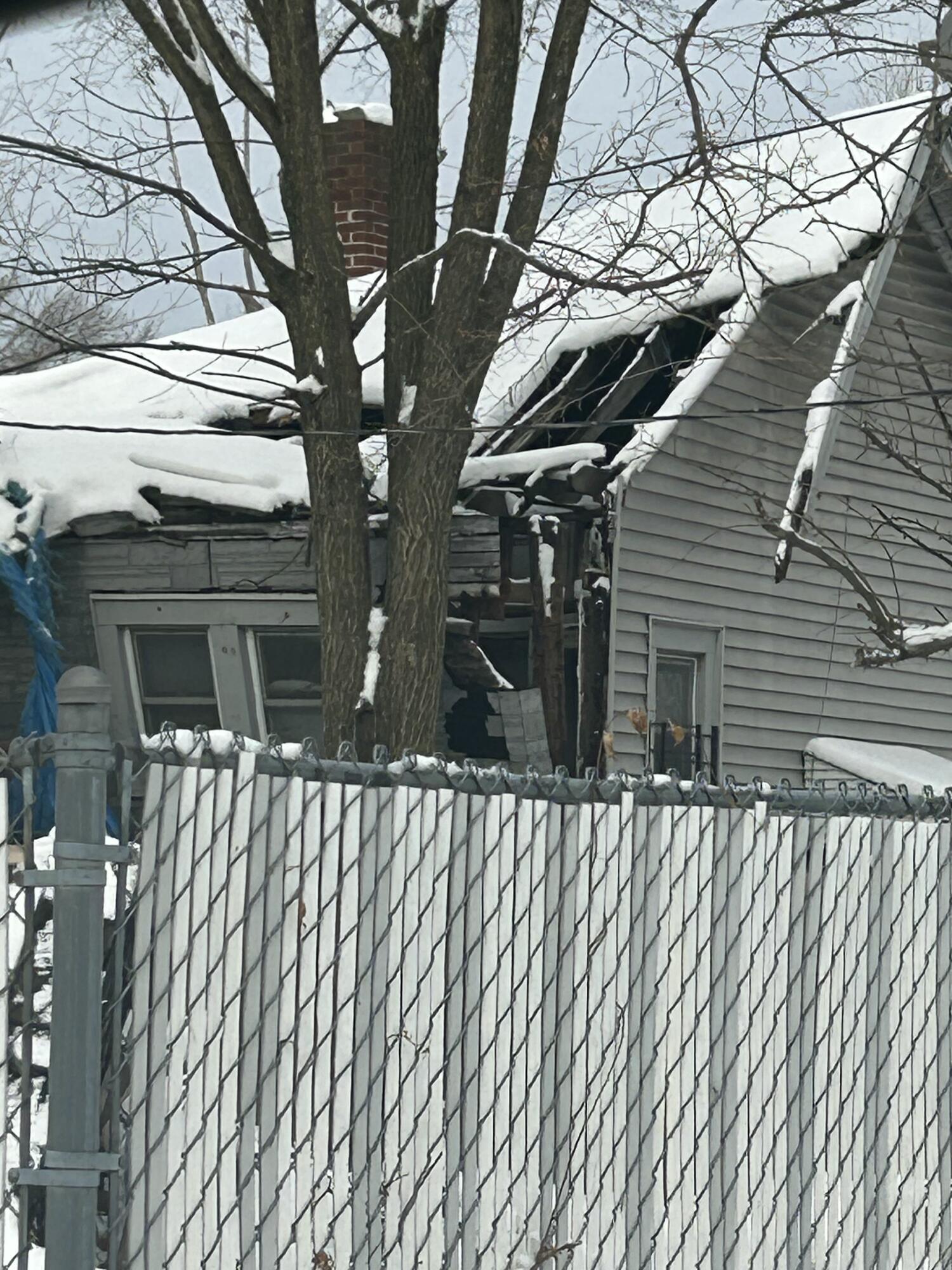 4387 Connecticut Street Gary, IN 46409 - Photo 20 of 20 a side view of a house with a tree