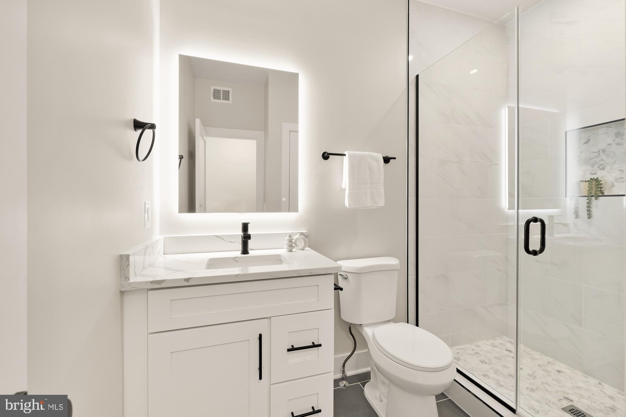 1910 Benning Road Northeast, Unit 5 Washington, DC 20002 - Photo 22 of 48 Primary Bath
