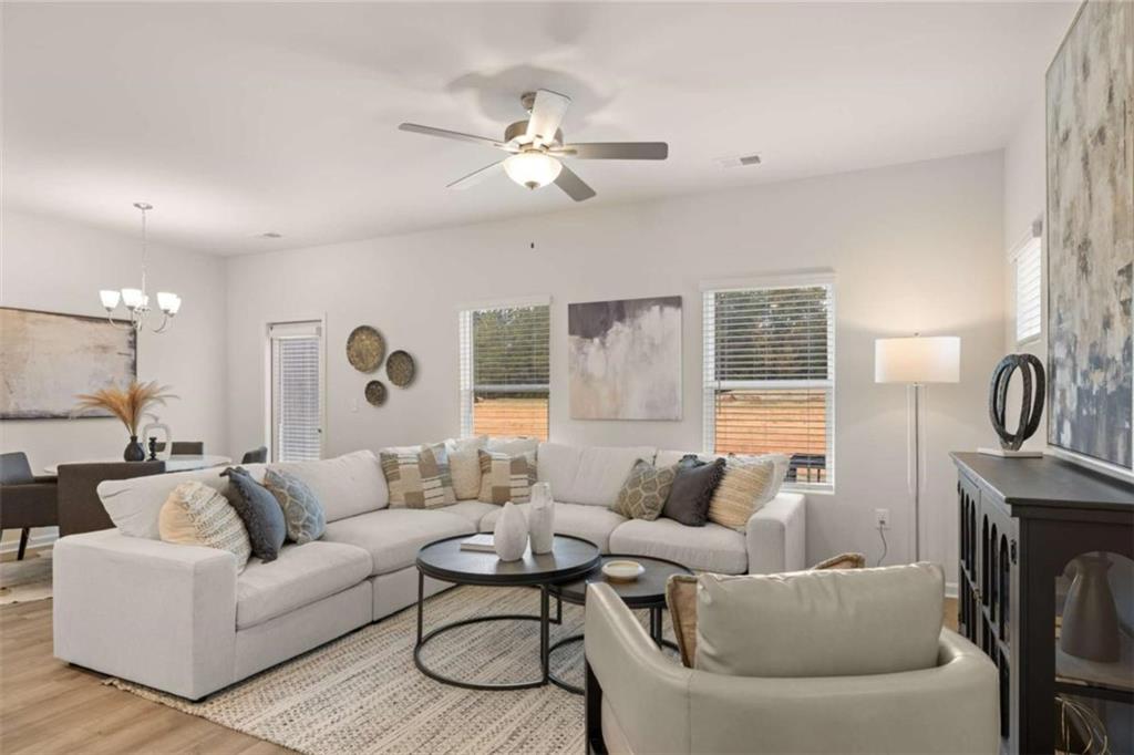 1047 Merritt Drive, Unit 88 Villa Rica, GA 30180 - Photo 36 of 47 a living room with furniture and a large window